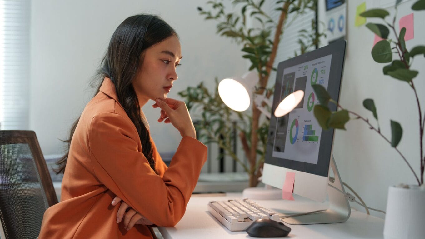 Young professional using tech stack to make data decisions