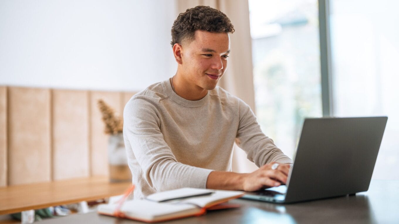 Young professional working at a laptop