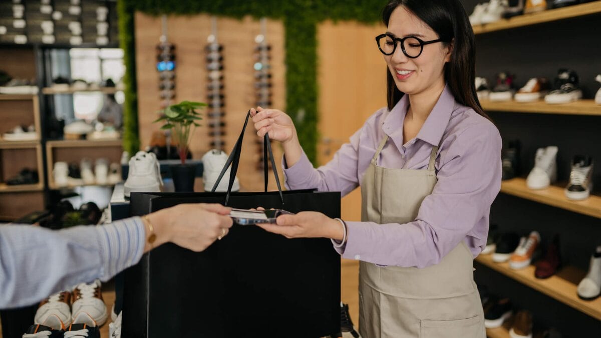 Payment by card in the store stock photo